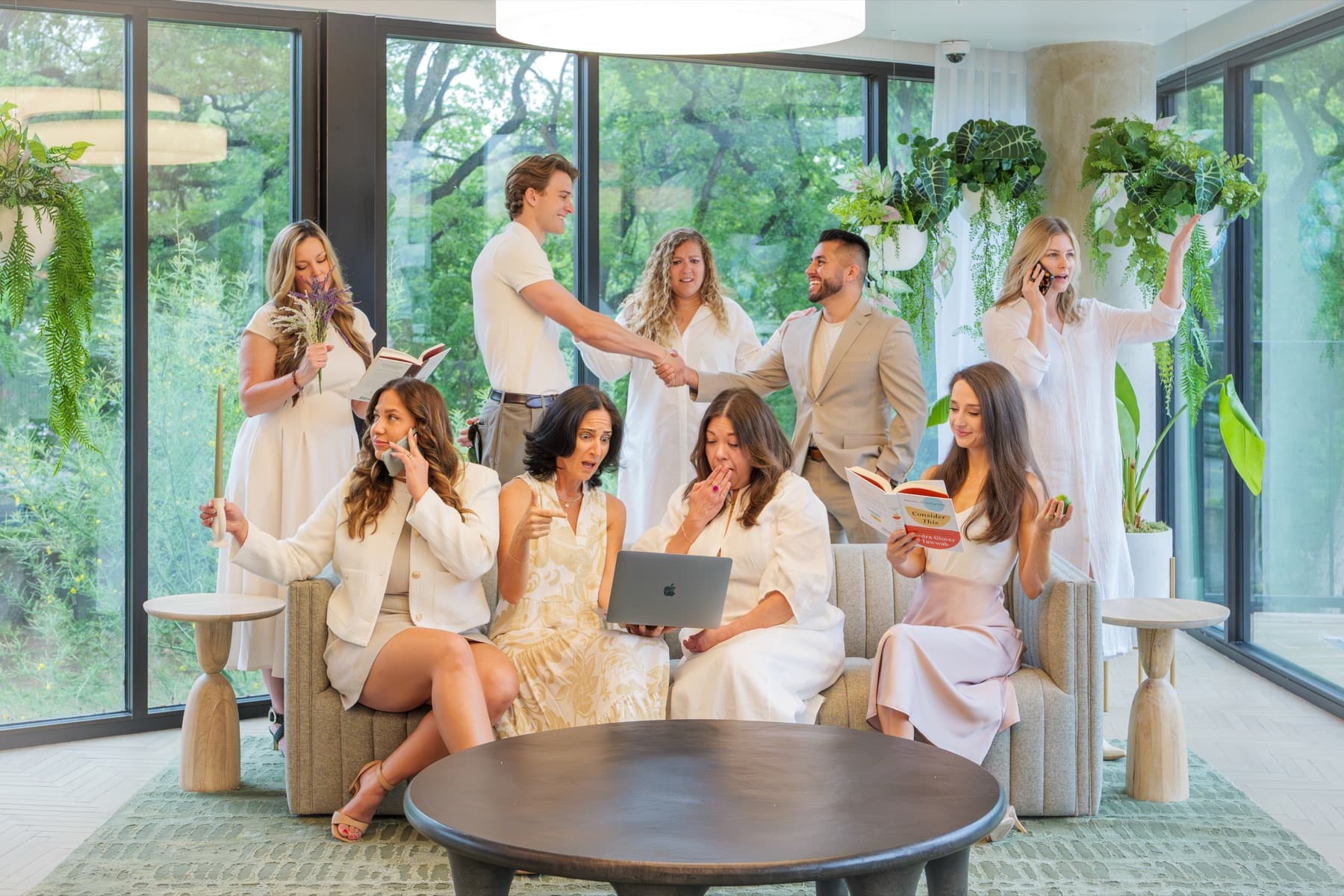 The Krew team together in a bright Austin interior